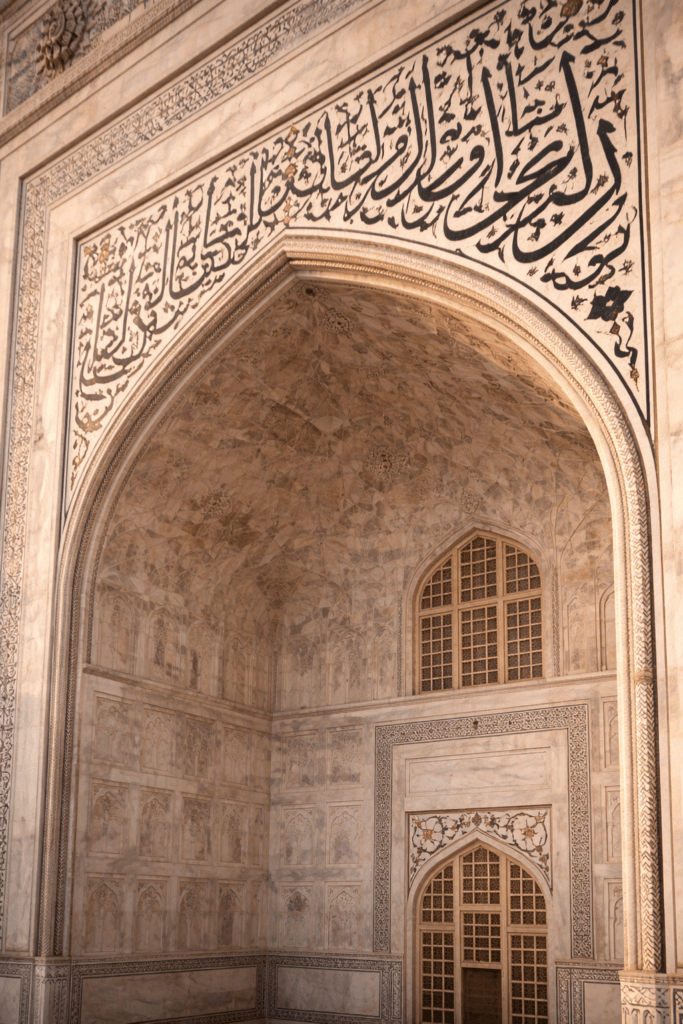 Quranic calligraphy on the Taj Mahal entrance arch
